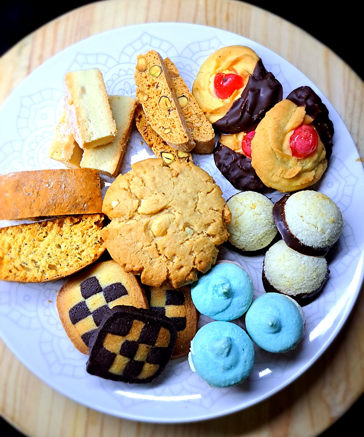 A platter of mixed biscotti, cookies and meringues