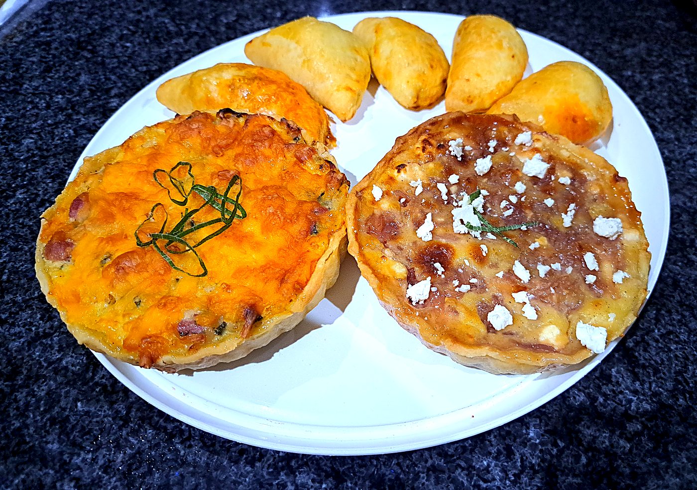 Two quiches with savoury pastries